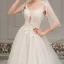 Élégant Ivoire Robe De Mariée 2019 Princesse Col v profond Sans Manches Dos Nu Appliques En Dentelle Perlage Cathedral Train Volants