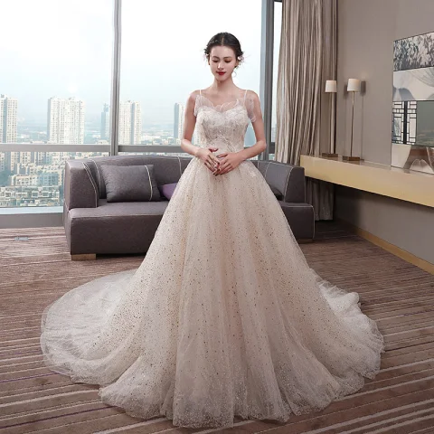 Hermoso Champán Vestidos De Novia 2019 Empire Spaghetti Straps Sin Mangas Sin Espalda Apliques Con Encaje Rebordear Perla Glitter Tul Chapel Train Ruffle