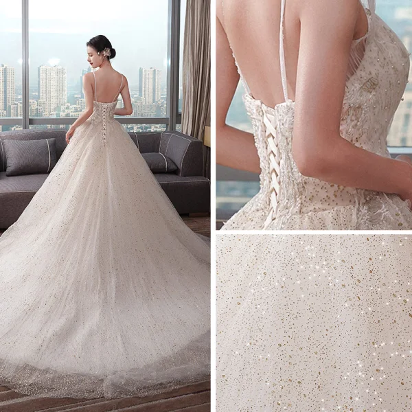 Schöne Champagner Brautkleider / Hochzeitskleider 2019 Empire Spaghettiträger Ärmellos Rückenfreies Applikationen Spitze Perlenstickerei Perle Glanz Tülle Kapelle-Schleppe Rüschen