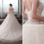 Schöne Champagner Brautkleider / Hochzeitskleider 2019 Empire Spaghettiträger Ärmellos Rückenfreies Applikationen Spitze Perlenstickerei Perle Glanz Tülle Kapelle-Schleppe Rüschen