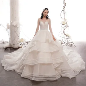 Luxury Gorgeous Champagne See Through Wedding Dresses 2019 A Line Princess Scoop Neck 3 4 Sleeve Backless Handmade Beading Cathedral Train Cascading Ruffles