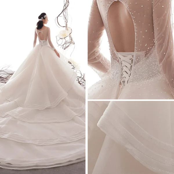 Luxus / Herrlich Champagner Durchsichtige Brautkleider / Hochzeitskleider 2019 A Linie Rundhalsausschnitt 3/4 Ärmel Rückenfreies Handgefertigt Perlenstickerei Kathedrale Schleppe Fallende Rüsche