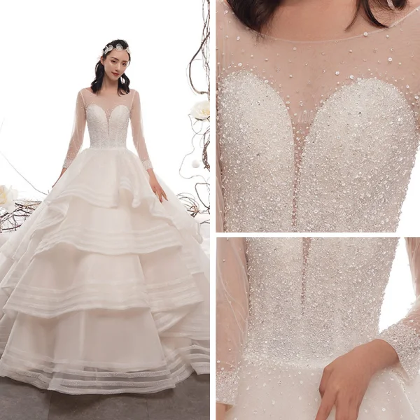 Luxus / Herrlich Champagner Durchsichtige Brautkleider / Hochzeitskleider 2019 A Linie Rundhalsausschnitt 3/4 Ärmel Rückenfreies Handgefertigt Perlenstickerei Kathedrale Schleppe Fallende Rüsche