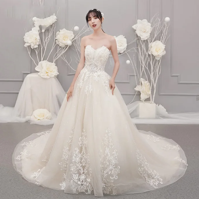 Fine Champagne Brudekjoler 2019 Prinsesse Kjæreste Uten Ermer Ryggløse Appliques Blonder Beading Glitter Tyll Chapel Train