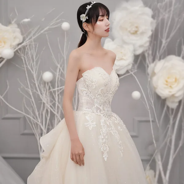 Fine Champagne Brudekjoler 2019 Prinsesse Kjæreste Uten Ermer Ryggløse Appliques Blonder Beading Glitter Tyll Chapel Train