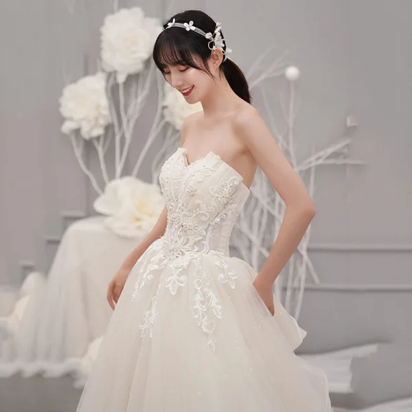 Fine Champagne Brudekjoler 2019 Prinsesse Kjæreste Uten Ermer Ryggløse Appliques Blonder Beading Glitter Tyll Chapel Train