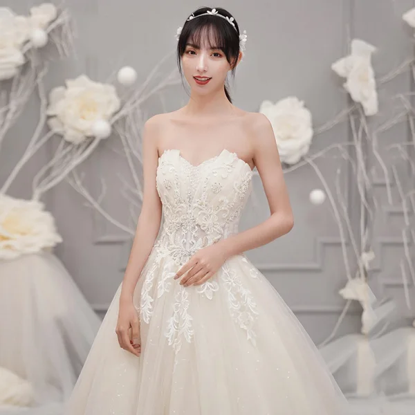 Fine Champagne Brudekjoler 2019 Prinsesse Kjæreste Uten Ermer Ryggløse Appliques Blonder Beading Glitter Tyll Chapel Train