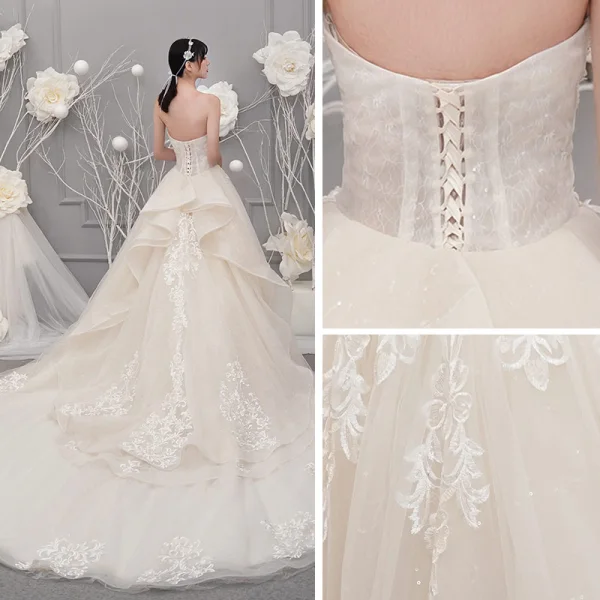 Fine Champagne Brudekjoler 2019 Prinsesse Kjæreste Uten Ermer Ryggløse Appliques Blonder Beading Glitter Tyll Chapel Train