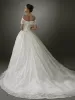 Luxury / Gorgeous Ivory Bling Bling Wedding Dresses 2019 A-Line / Princess Off-The-Shoulder Short Sleeve Backless Glitter Tulle Court Train