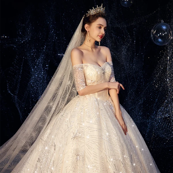 Bling Bling Champagne Robe De Mariée 2019 Robe Boule De l'épaule Manches Courtes Dos Nu Glitter Paillettes Cathedral Train Volants