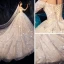 Bling Bling Champagne Robe De Mariée 2019 Robe Boule De l'épaule Manches Courtes Dos Nu Glitter Paillettes Cathedral Train Volants