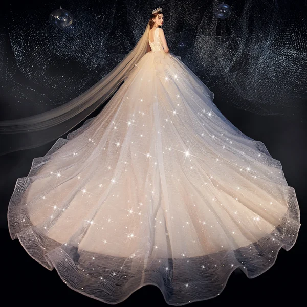 Bling Bling Champagne Wedding Dresses 2019 Ball Gown Deep V-Neck Sleeveless Backless Glitter Tulle Ruffle Cathedral Train