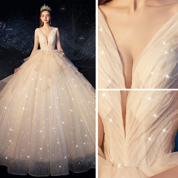 Bling Bling Champagne Wedding Dresses 2019 Ball Gown Deep V-Neck Sleeveless Backless Glitter Tulle Ruffle Cathedral Train