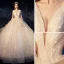 Bling Bling Champagne Wedding Dresses 2019 Ball Gown Deep V-Neck Sleeveless Backless Glitter Tulle Ruffle Cathedral Train