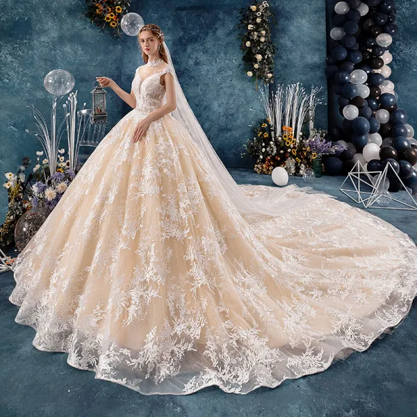 Vintage / Retro Champagne See-through Wedding Dresses 2019 Ball Gown High Neck Sleeveless Backless Heart-shaped Appliques Lace Handmade  Beading Royal Train Ruffle