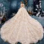 Vintage / Originale Champagne Transparentes Robe De Mariée 2019 Robe Boule Col Haut Sans Manches Dos Nu Forme de coeur Appliques En Dentelle Fait main Perlage Royal Train Volants