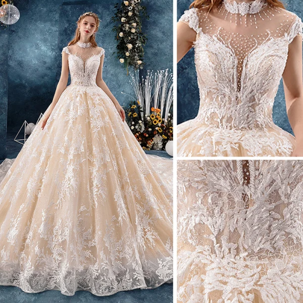 Vintage / Originale Champagne Transparentes Robe De Mariée 2019 Robe Boule Col Haut Sans Manches Dos Nu Forme de coeur Appliques En Dentelle Fait main Perlage Royal Train Volants