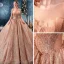 Unique Gold Durchsichtige Brautkleider / Hochzeitskleider 2019 Ballkleid Rundhalsausschnitt Lange Ärmel Rückenfreies Herzförmig Perlenstickerei Glanz Pailletten Kathedrale Schleppe Rüschen