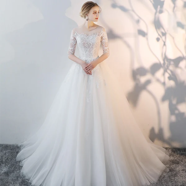 Charmant Ivory / Creme Sommer Durchsichtige Brautkleider 2018 A Linie Rundhalsausschnitt 3/4 Ärmel Rückenfreies Applikationen Mit Spitze Durchbohrt Rüschen Kapelle-Schleppe