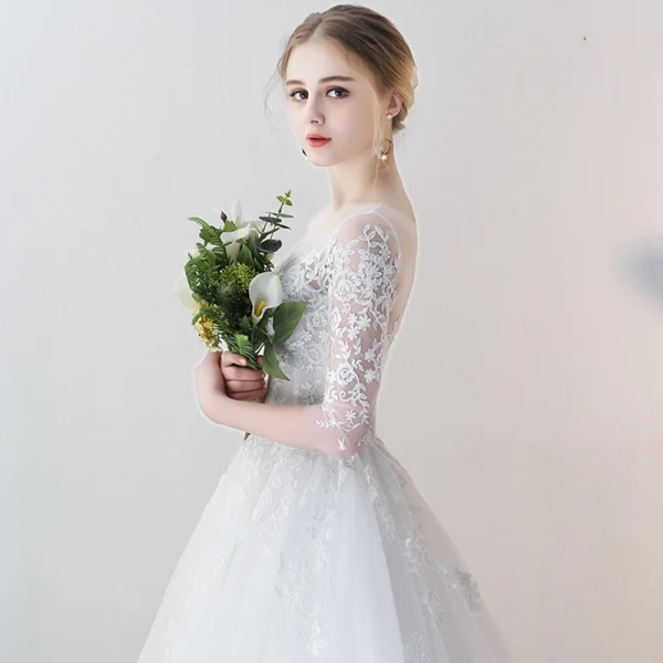 Charmant Ivory / Creme Sommer Durchsichtige Brautkleider 2018 A Linie Rundhalsausschnitt 3/4 Ärmel Rückenfreies Applikationen Mit Spitze Durchbohrt Rüschen Kapelle-Schleppe