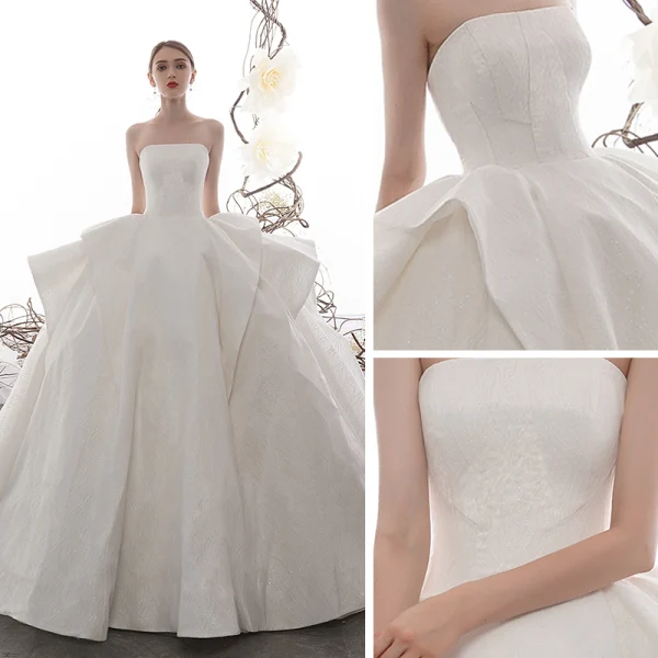 High-end Ivory Wedding Dresses 2019 Ball Gown Strapless Sleeveless Backless Glitter Tulle Cathedral Train Ruffle