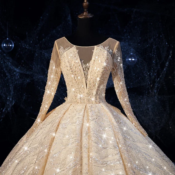 Bling Bling Champagne See-through Wedding Dresses 2019 Ball Gown Scoop Neck Long Sleeve Backless Beading Glitter Tulle Royal Train Ruffle