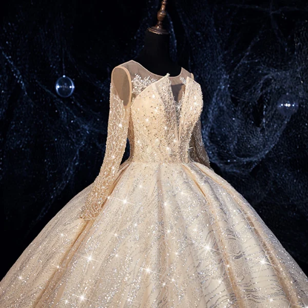 Bling Bling Champagne See-through Wedding Dresses 2019 Ball Gown Scoop Neck Long Sleeve Backless Beading Glitter Tulle Royal Train Ruffle