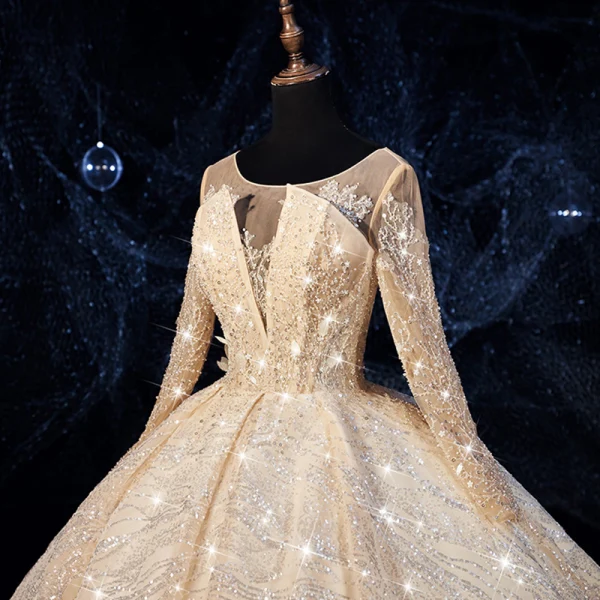 Bling Bling Champagne See-through Wedding Dresses 2019 Ball Gown Scoop Neck Long Sleeve Backless Beading Glitter Tulle Royal Train Ruffle