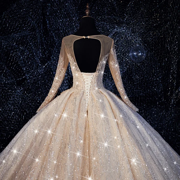 Bling Bling Champagne See-through Wedding Dresses 2019 Ball Gown Scoop Neck Long Sleeve Backless Beading Glitter Tulle Royal Train Ruffle