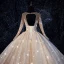 Bling Bling Champagne See-through Wedding Dresses 2019 Ball Gown Scoop Neck Long Sleeve Backless Beading Glitter Tulle Royal Train Ruffle