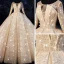 Bling Bling Champagne See-through Wedding Dresses 2019 Ball Gown Scoop Neck Long Sleeve Backless Beading Glitter Tulle Royal Train Ruffle
