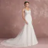 Elegant Ivory Pierced Wedding Dresses 2018 Trumpet / Mermaid V-Neck Sleeveless Appliques Lace Court Train