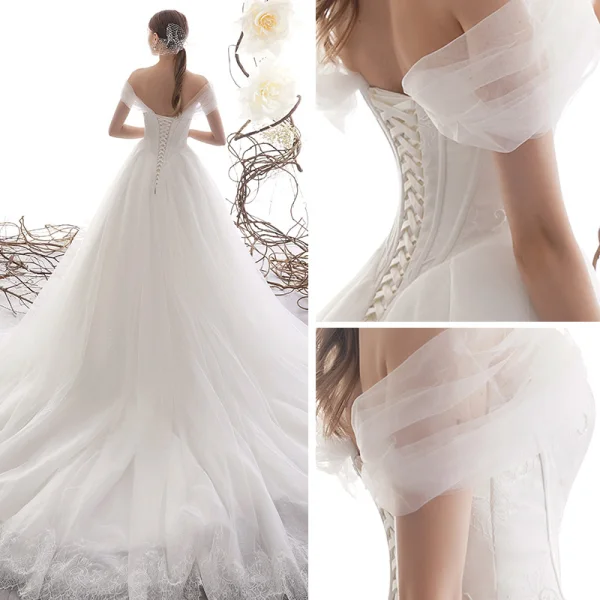 Elegant Ivory Wedding Dresses 2019 A-Line / Princess Off-The-Shoulder Short Sleeve Backless Glitter Tulle Court Train Ruffle