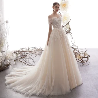 Chic Belle Champagne Robe De Mariée 2019 Princesse De L 039 Épaule Manches Courtes Dos Nu Glitter Appliques En Dentelle Perlage Tribunal Train Volants
