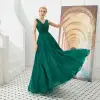Meilleure Vert Foncé Robe De Soirée 2019 Princesse V-Cou Sans Manches Perlage Glitter Tulle Longue Volants Dos Nu Robe De Ceremonie