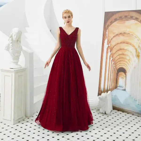 Meilleure Vert Foncé Robe De Soirée 2019 Princesse V-Cou Sans Manches Perlage Glitter Tulle Longue Volants Dos Nu Robe De Ceremonie