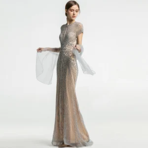 Luxe Champagne Transparentes Robe De Soirée 2019 Trompette Sirène Encolure Dégagée Manches Courtes Fait Main Perlage Train De Balayage Robe De Ceremonie