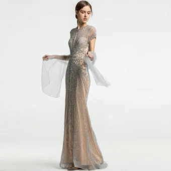 Luxe Champagne Transparentes Robe De Soirée 2019 Trompette Sirène Encolure Dégagée Manches Courtes Fait Main Perlage Train De Balayage Robe De Ceremonie