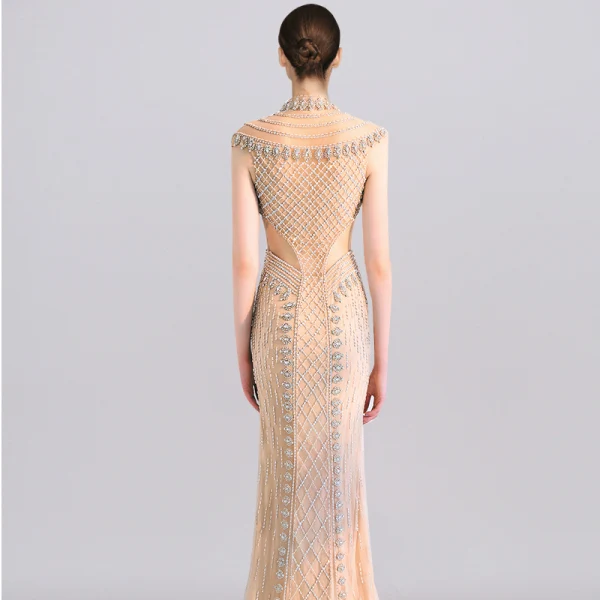 Luxe Champagne Transparentes Robe De Soirée 2019 Trompette / Sirène Col Haut Sans Manches Fait main Perlage Train De Balayage Robe De Ceremonie