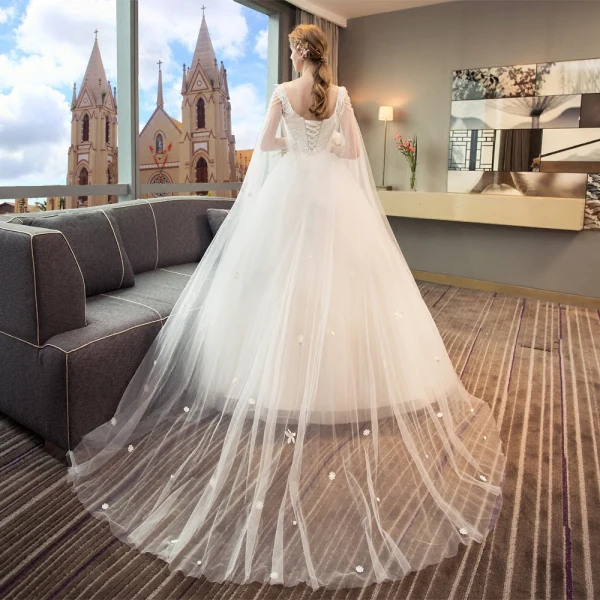 Discount Ivory Wedding Dresses 2018 Ball Gown Scoop Neck Sleeveless Backless Appliques Lace Beading Pearl Sequins Ruffle Watteau Train
