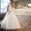 Discount Ivory Wedding Dresses 2018 Ball Gown Scoop Neck Sleeveless Backless Appliques Lace Beading Pearl Sequins Ruffle Watteau Train