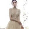 Vintage / Retro Champagne See-through Wedding Dresses 2019 A-Line / Princess High Neck Short Sleeve Beading Tassel Appliques Lace Cathedral Train Ruffle