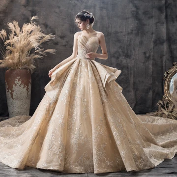 Luxury Gorgeous Champagne Wedding Dresses 2019 Ball Gown Sweetheart Sleeveless Backless Appliques Lace Sequins Glitter Tulle Cathedral Train Ruffle