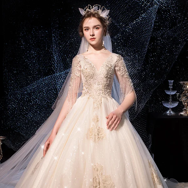 Luxus / Herrlich Champagner Brautkleider / Hochzeitskleider 2019 A Linie Durchsichtige Tiefer V-Ausschnitt Kurze Ärmel Perlenstickerei Quaste Rückenfreies Applikationen Spitze Glanz Tülle Kathedrale Schleppe