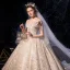 Sparkly Champagne Wedding Dresses 2019 Ball Gown Off-The-Shoulder Short Sleeve Backless Glitter Sequins Tulle Cathedral Train Ruffle
