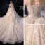 Sparkly Champagne Wedding Dresses 2019 Ball Gown Off-The-Shoulder Short Sleeve Backless Glitter Sequins Tulle Cathedral Train Ruffle