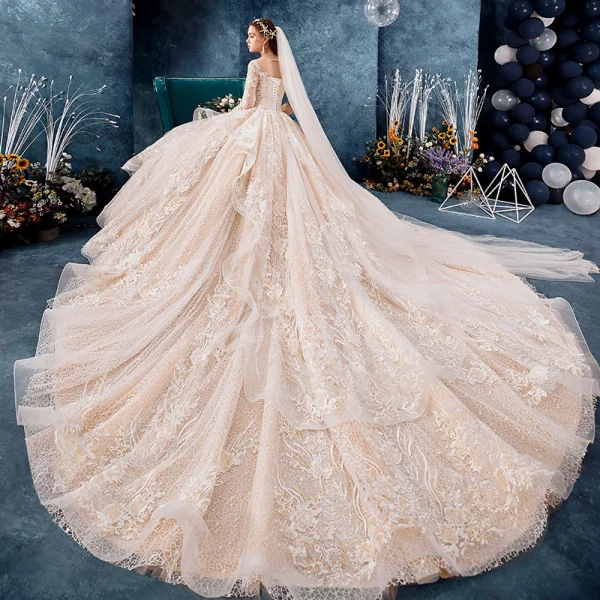 Romantic Champagne See-through Wedding Dresses 2019 Ball Gown Scoop Neck Long Sleeve Backless Appliques Lace Beading Cathedral Train Ruffle
