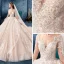 Romantic Champagne See-through Wedding Dresses 2019 Ball Gown Scoop Neck Long Sleeve Backless Appliques Lace Beading Cathedral Train Ruffle
