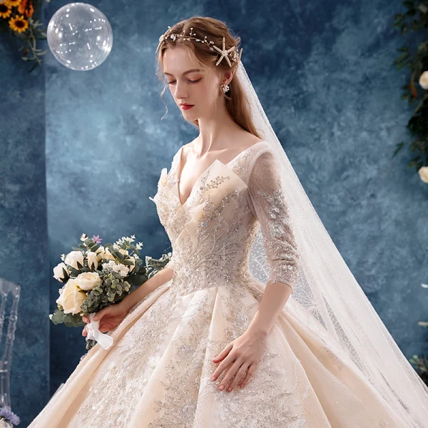Schöne Champagner Brautkleider / Hochzeitskleider 2019 Ballkleid 3/4 Ärmel V-Ausschnitt Rückenfreies Applikationen Spitze Pailletten Perlenstickerei Glanz Tülle Kapelle-Schleppe Rüschen