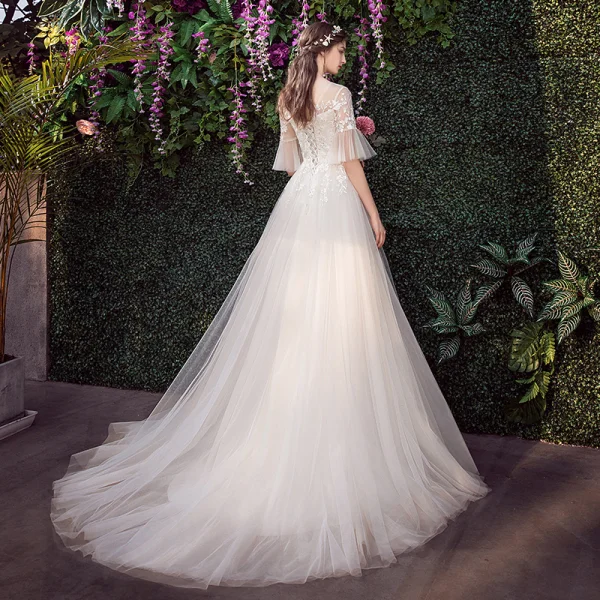 Affordable Champagne Outdoor / Garden See-through Wedding Dresses 2019 A-Line / Princess Scoop Neck Bell sleeves Backless Appliques Lace Sequins Sweep Train Ruffle